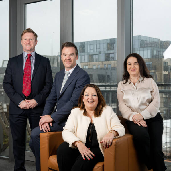 Staffline team members smiling at camera