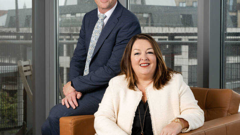 Two Staffline team members smiling for photo